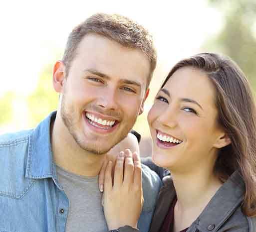 Happy couple with attractive smiles